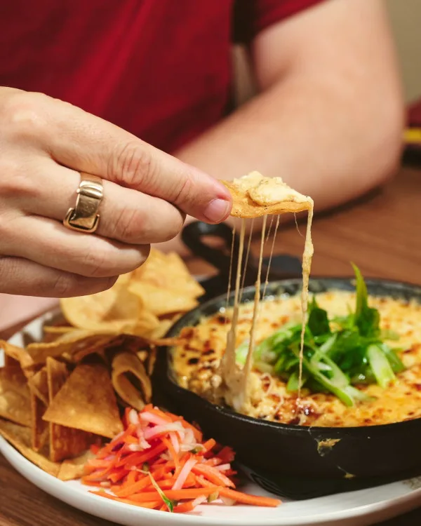 Melted queso and nachos