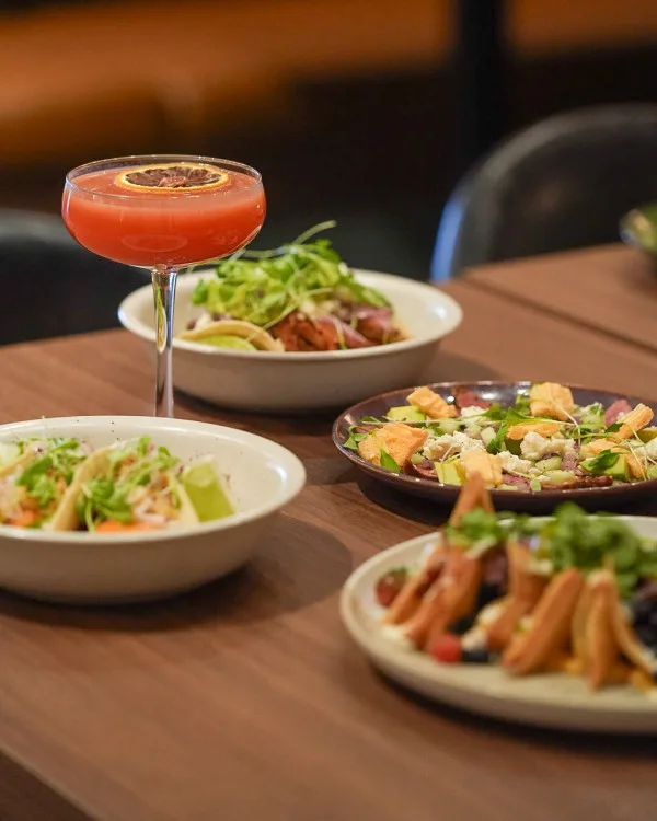 Cocktail and tacos on the table